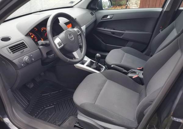 Opel Astra cena 17500 przebieg: 243080, rok produkcji 2011 z Ostróda małe 704